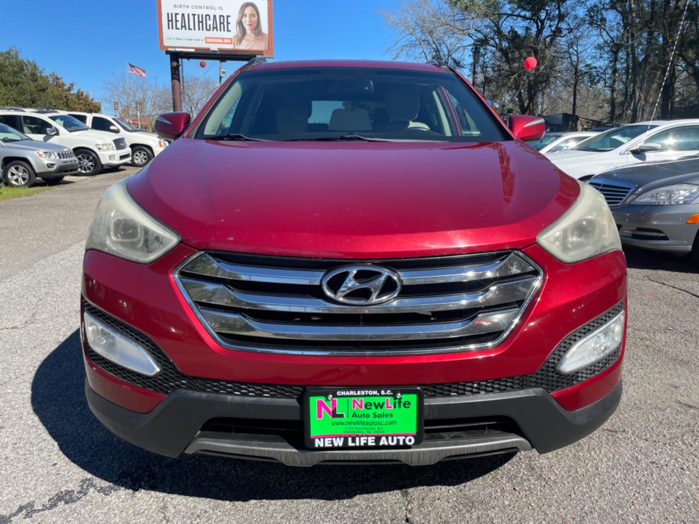 2013 RED HYUNDAI SANTA FE SPORT 2.0T (5XYZU3LA3DG) with an 2.0L engine, Automatic transmission, located at 5103 Dorchester Rd., Charleston, SC, 29418-5607, (843) 767-1122, 36.245171, -115.228050 - Leather, CD/AUX/Sat/Bluetooth, Dual Climate, Power Everything (windows, locks, seats, mirrors), Heated Seats, Rear Heated Seats, Push Button Start, Keyless Entry, Alloy Wheels. Local Trade-in!! Located at New Life Auto Sales! 2023 WINNER for Post & Courier's Charleston's Choice Pre-owned Car Dealer - Photo#1